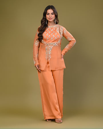 Pastel orange zari embroidered organza kurti and palazzo pant